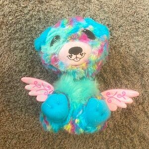 Rainbow dog hatchimals working wings pink yellow blue white happy